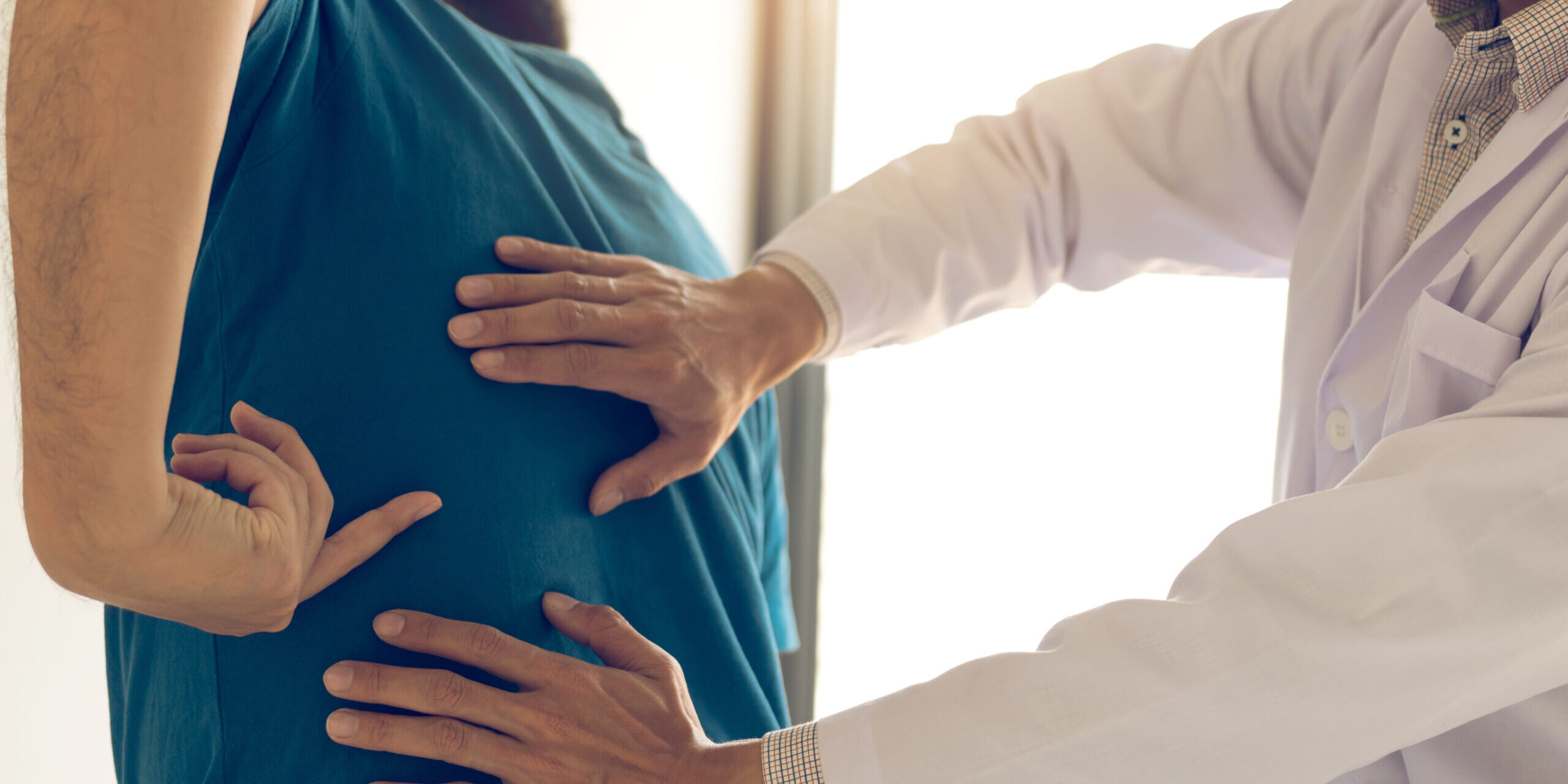 Patient is pointing to the point where the muscle pain is provid